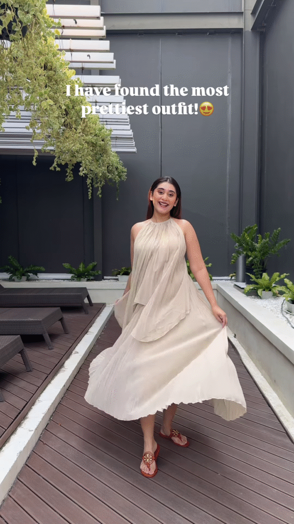 Elegant Flowing Beige Dress with Halter Neck – A Dreamy Day Look